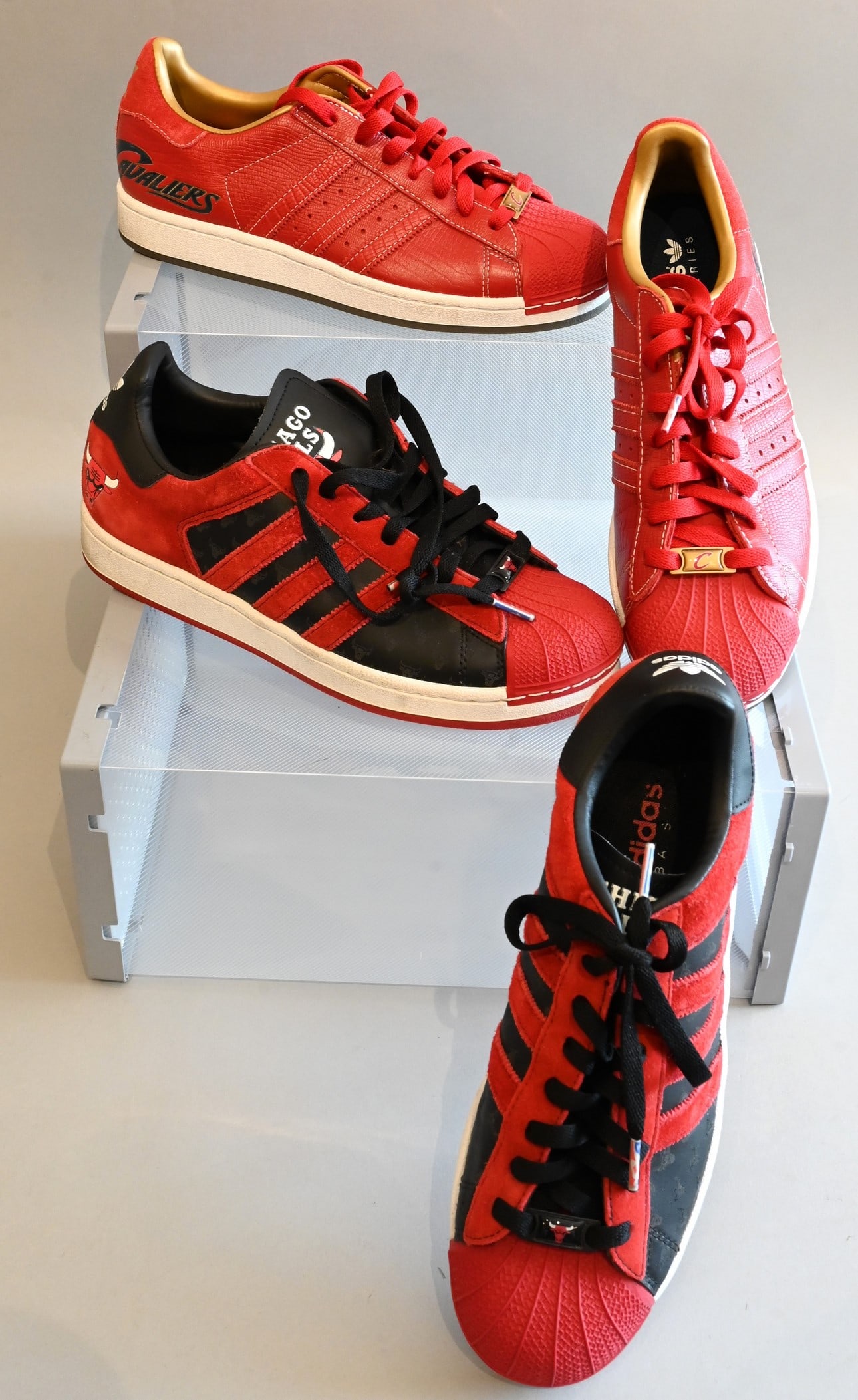 Two Pairs of Men's Adidas Sneakers: Two Pairs of Men's Adidas Sneakers Adidas Sneakers Superstar 1 NBA Series 'Cleveland Cavaliers' in Red and Gold Slightly used with few scuffs Size 8.5 Adidas Sneakers Superstar 1 NBA Series 'Chicago B