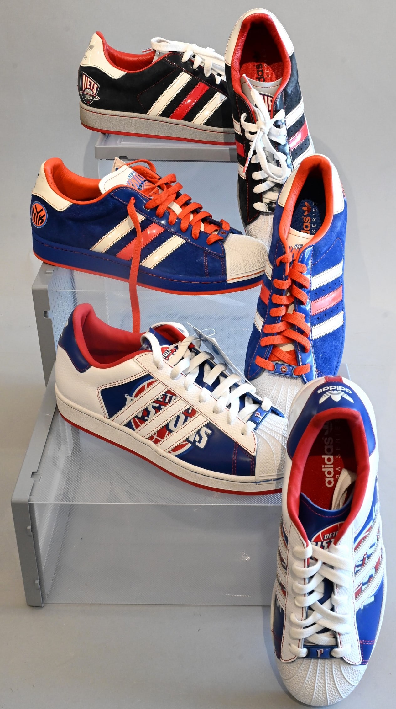 Three Pairs of Men's Adidas Sneakers: Three Pairs of Men's Adidas Sneakers Adidas Sneakers Superstar 1 NBA Series "Brooklyn Nets" in Red, White, blue and grey Slightly used with few scuffs, Retails for $175 Size 8.5 Adidas Sneakers Supers