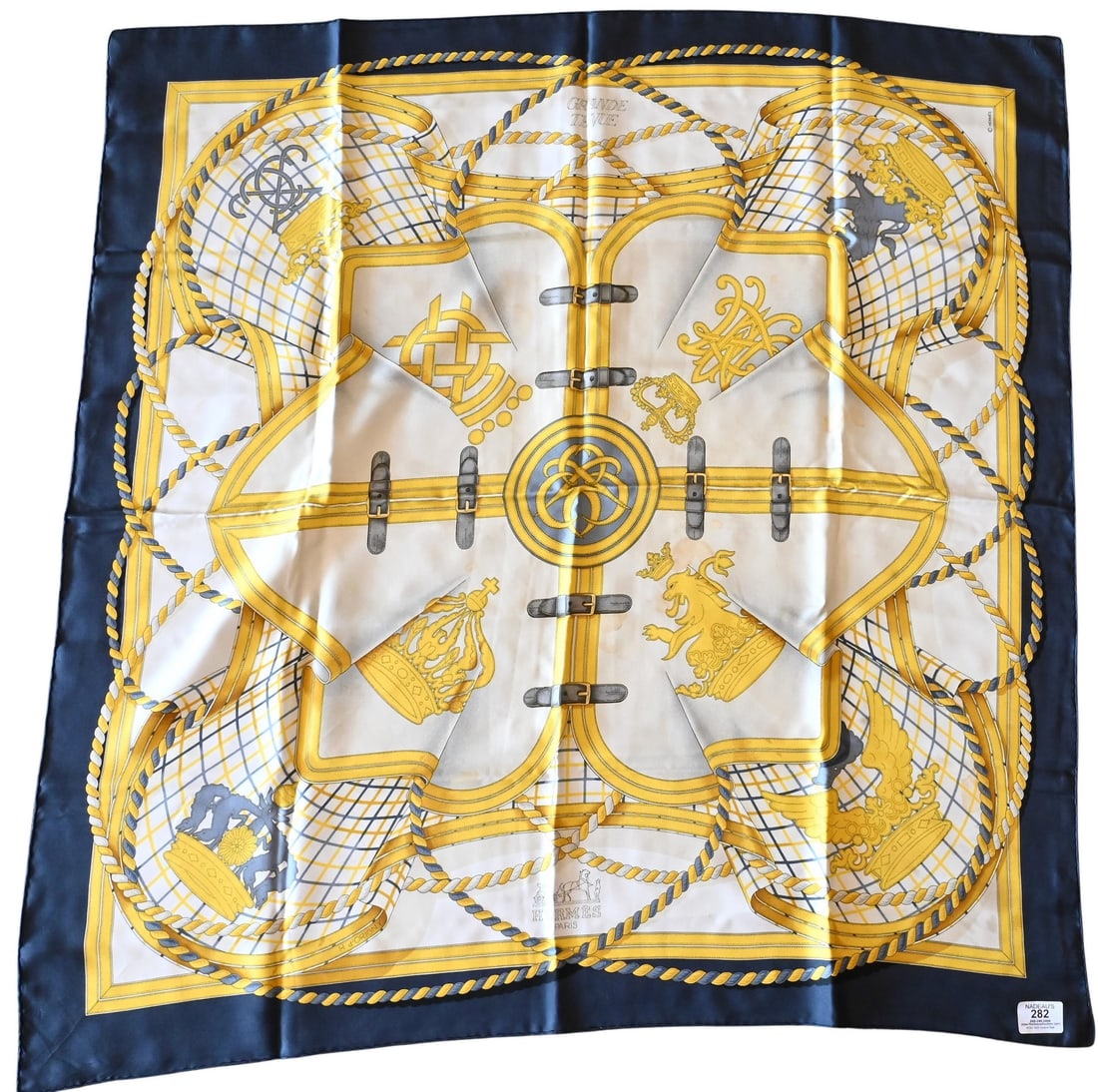 Hermes Paris "Grande Tenue" Silk Scarf: Hermes Paris "Grande Tenue" Silk Scarf in gold, gray, and white, by Henri d'Origny 1985 35" x 35" Condition: some staining