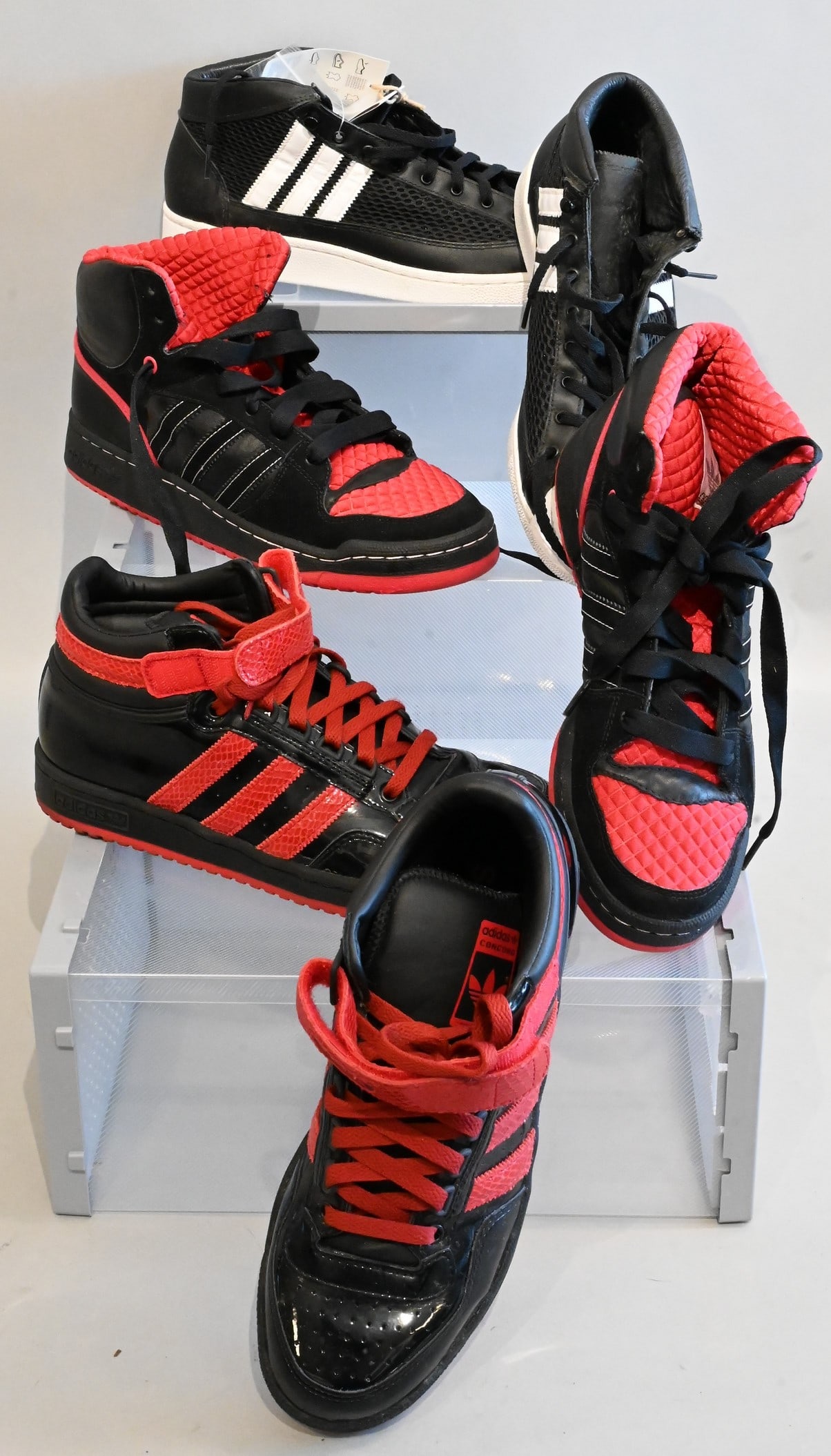 Three Pairs of Men's Adidas Sneakers: Three Pairs of Men's Adidas Sneakers Adidas Sneakers, Vintage James Bond Hi Top in Black and White Includes original tag and extra laces, slightly used with few scuffs, Retails for $75 Size 8.5 Adidas