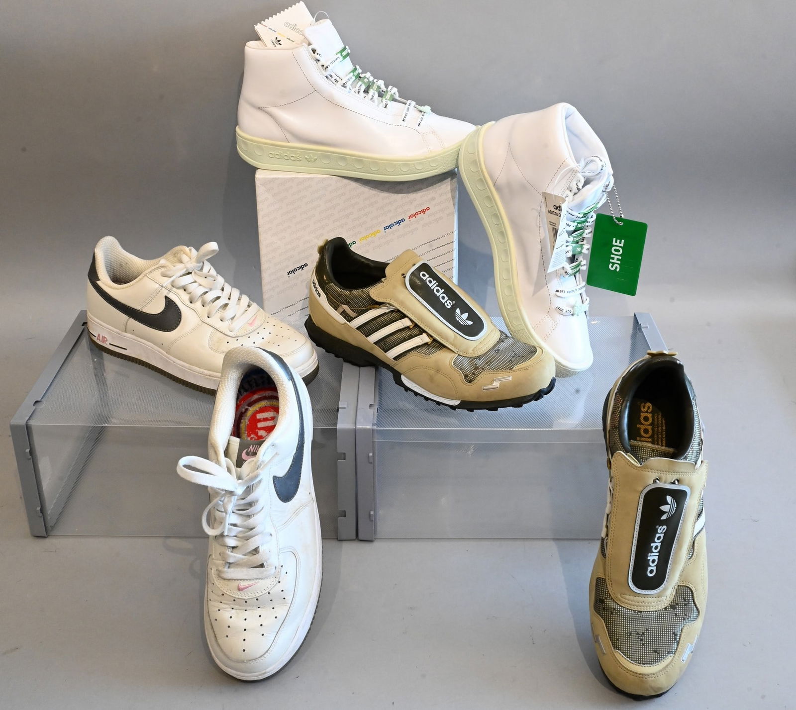 Three Pairs of Men's Adidas Sneakers: Three Pairs of Men's Adidas Sneakers Adidas Sneakers Track Shoe in Brown Slightly used with few marks and scratches Size 9 Adidas Sneakers Adicolor High Tops in White Not appeared to be worn with orig
