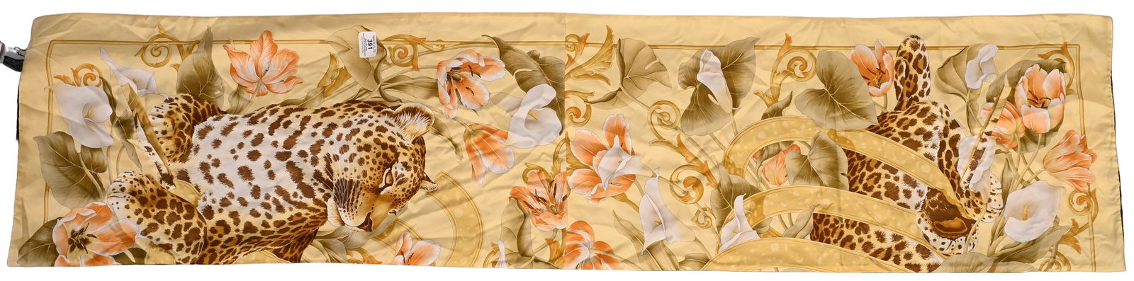 Salvatore Ferragamo Animal Kingdom Silk and Velvet Scarf: Salvatore Ferragamo Animal Kingdom Silk and Velvet Scarf in gold, peach and green with leopard/jaguar and floral design, pocket holes, price tag still attached from Saks 5th Avenue 14"x61"