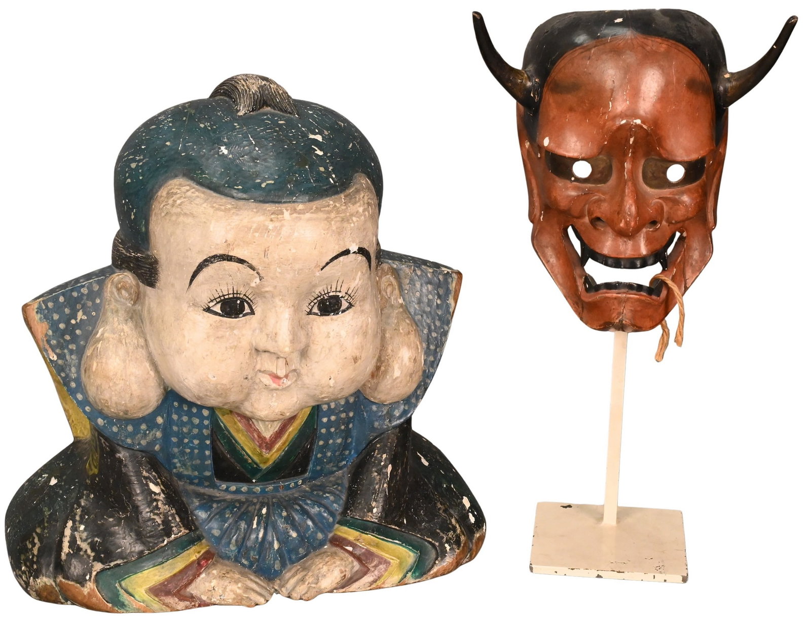 Two Japanese Carved Polychrome Figures: Two Japanese Carved Polychrome Figures to include Hannya Deity Noh Mask, circa 1780-1830 red lacquered demon mask having pointed teeth and horns height 9 inches "Fukusuke" good luck figure for busines