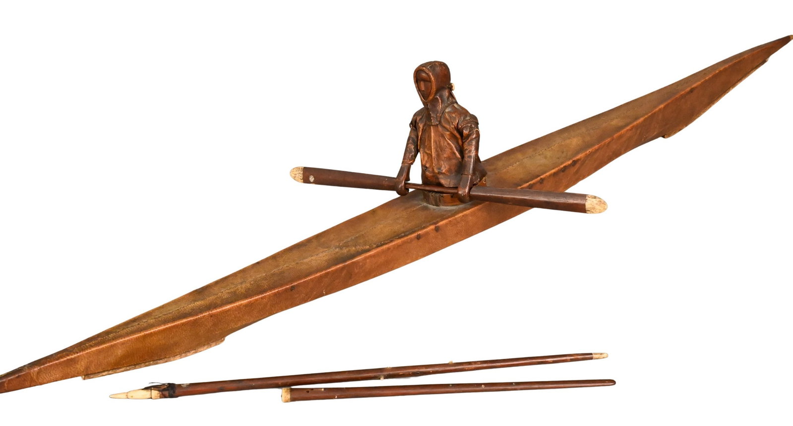 19th Century Alaskan Native, Inuit Kayak Model: 19th Century Alaskan Native, Inuit Kayak Model featuring a carved and painted Inuit/Yupik man in leather parka sitting in a wooden and seal leather kayak with fine bone inlay, he holds a spear, along 