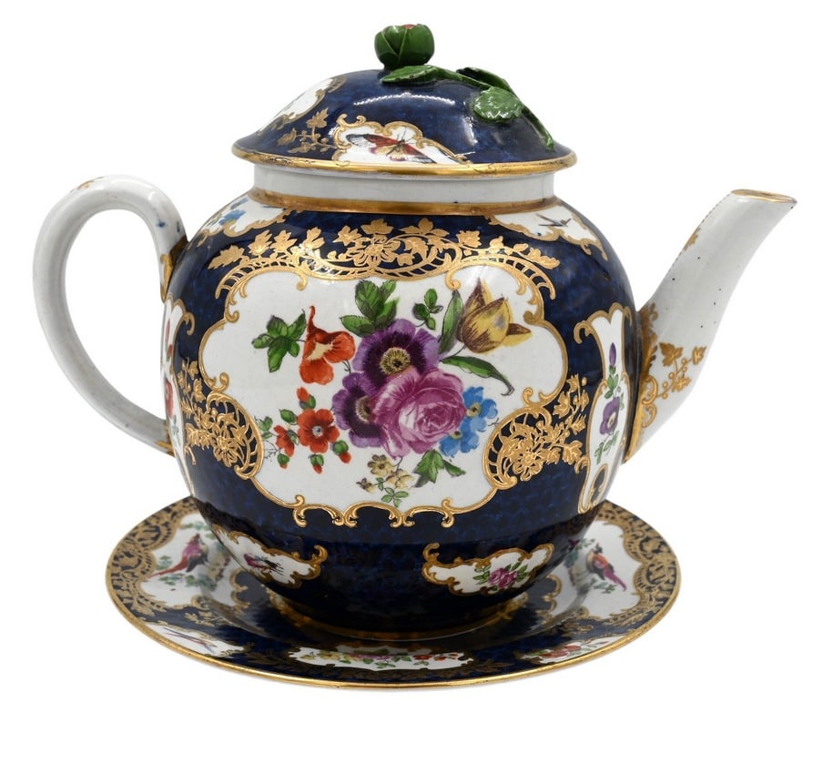 Worcester Pheasant Cobalt Porcelain Teapot: Worcester Pheasant Cobalt Porcelain Teapot having floral finial, gilt accents, along with saucer, 19th century height 5 1/2 inches, length 7 inches Provenance: From Collection of Steven and Paula Schi