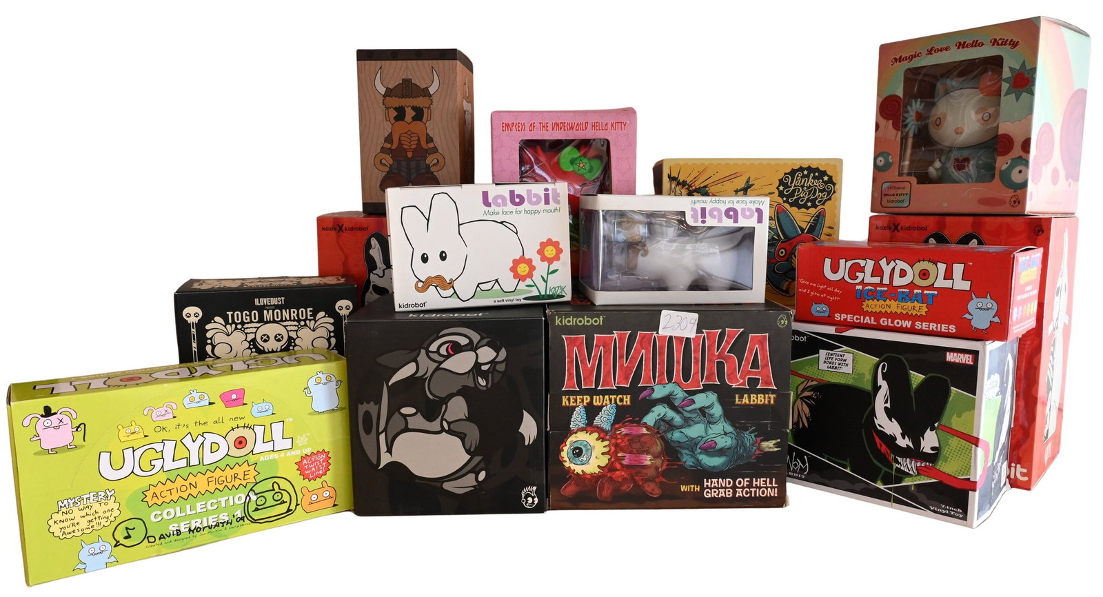 Assorted Group of 16 Ugly Dolls and Kidrobot Figures: Assorted Group of 16 Ugly Dolls and Kidrobot Figures including Ugly Doll action figures, Dunny Togo Monroe, two Kidrobot X Hello Kitty vinyl figures, Six Kidrobot Labbits, Venom, two Yankee Pig Dog, M