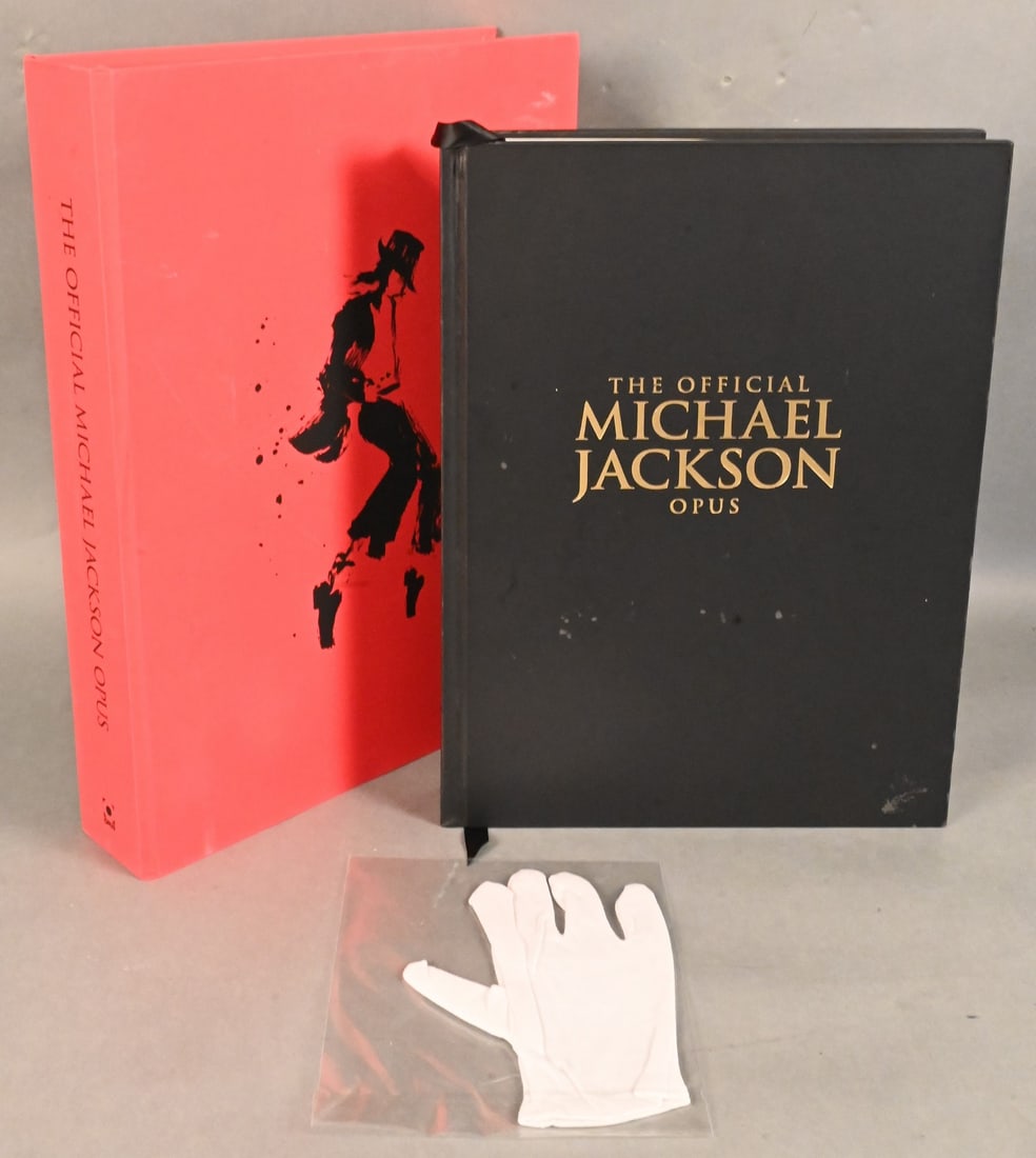 The Official Michael Jackson Opus: "The Official Michael Jackson Opus" 404 page leatherbound book along with white glove Published, 2009, Opus 18" x 13" Condition: almost new with original packaging