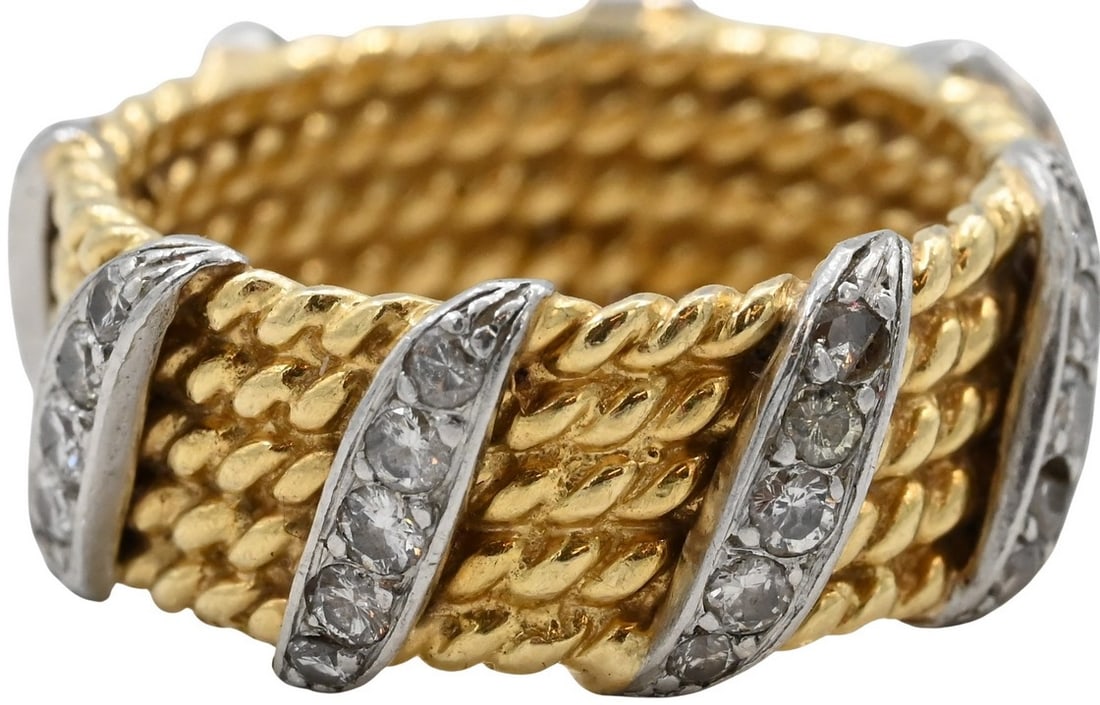18K Yellow and White Gold and Diamond Ring: 18K Yellow and White Gold and Diamond Ring having eight diamonds size 6 1/2, total weight 8.4 grams