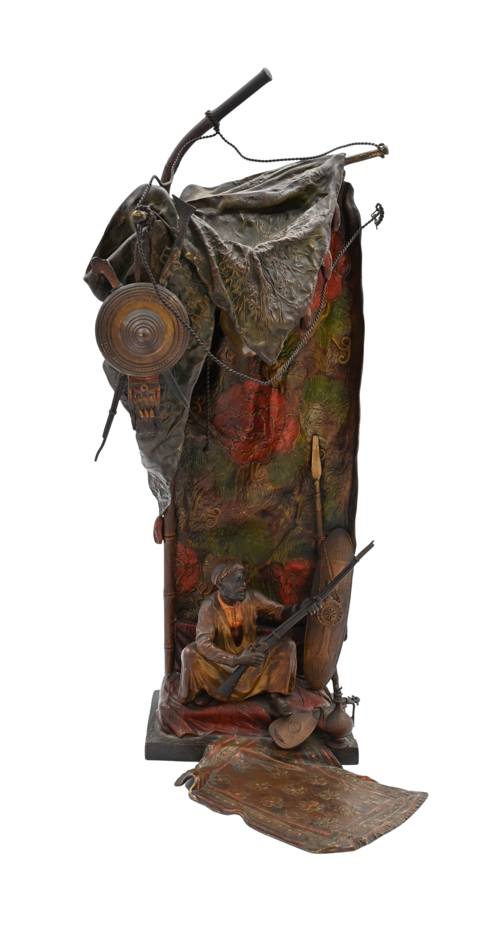 Franz Xavier Bergman (1861-1936): Franz Xavier Bergman (1861-1936) Austrian cold painted bronze lamp of Bedouin guard sitting with his rifle in front of draped floral decorated tent, surrounded with a Persian rug, coffee pot, sitar, w