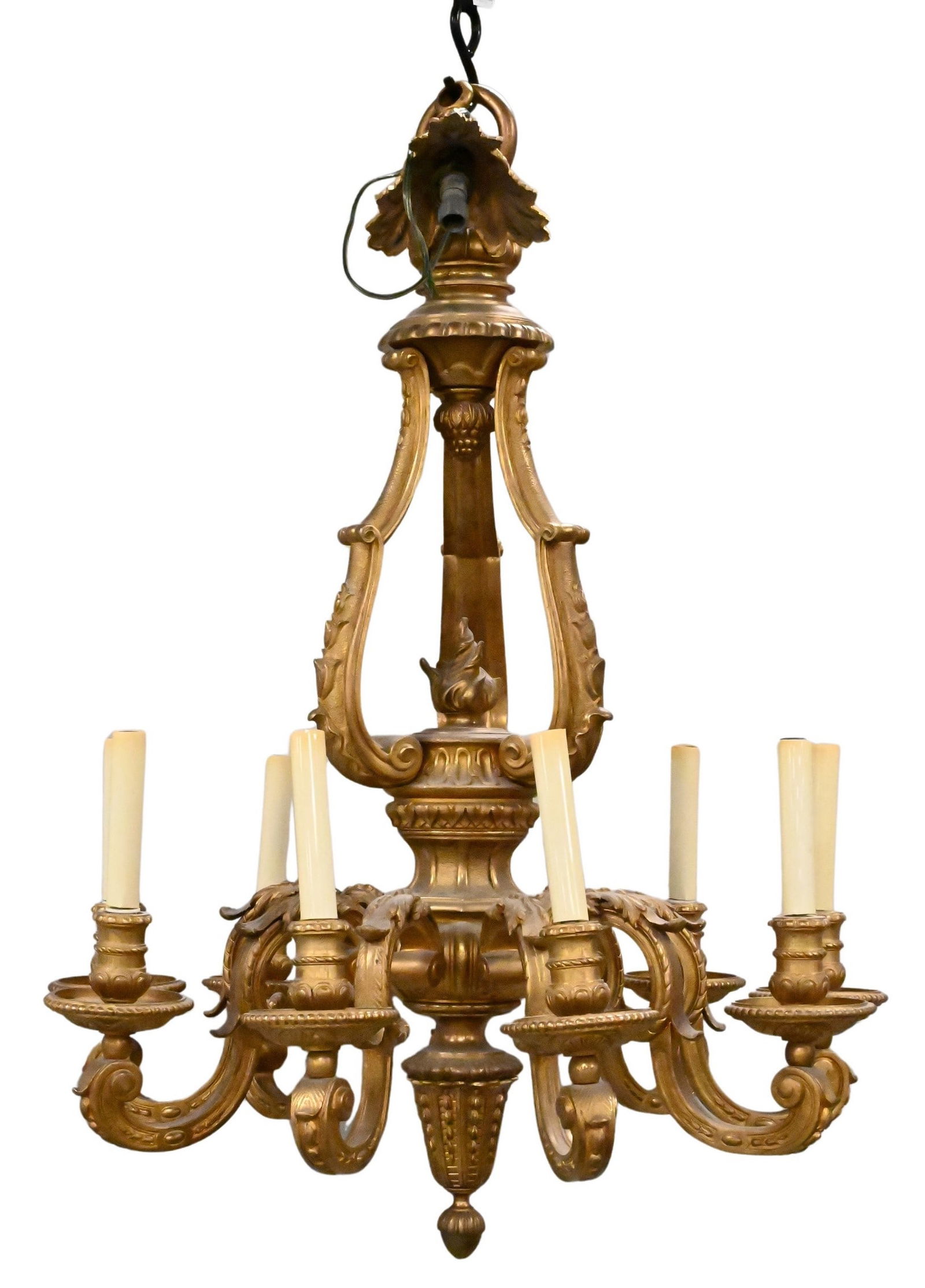Ornate Gilt Bronze Eight Light Chandelier: Ornate Gilt Bronze Eight Light Chandelier having scrolling arms and torch and flame body, wired for electricity, height approximately 32 inches Condition: very good condition, no issues