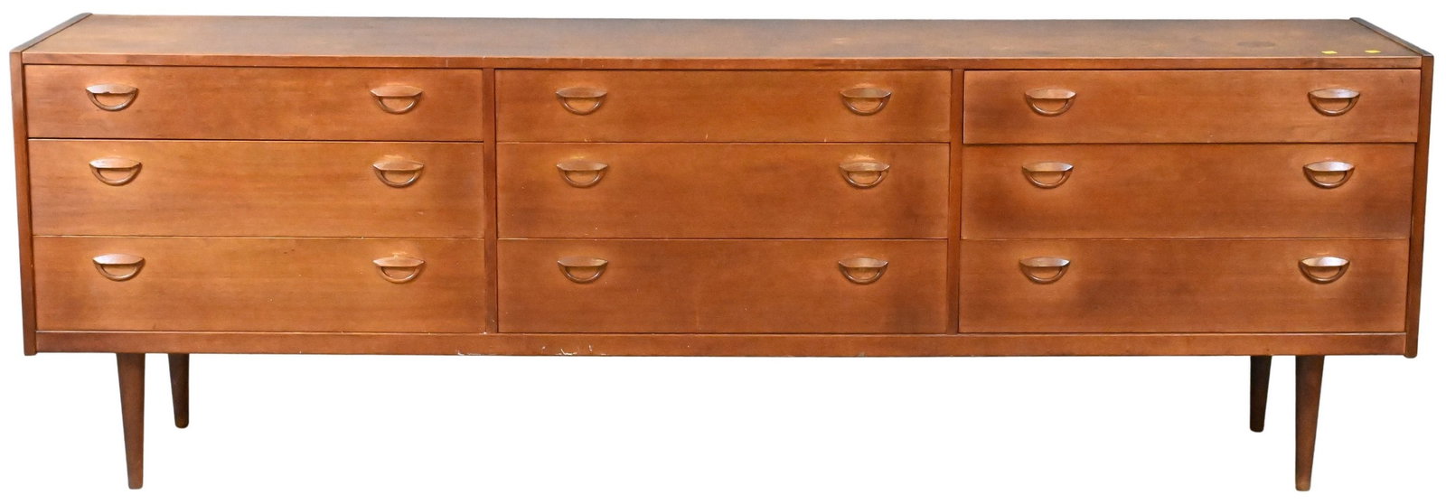 1970's Teak Veneered Triple Dresser: 1970's Teak Veneered Triple Dresser having nine drawers height 29 inches, top 18" x 89"