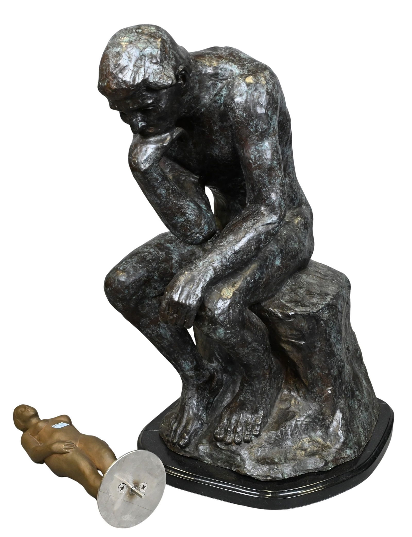 Two Piece Group: Two Piece Group to include After Auguste Rodin "Thinker" metal signed A. Rodin, and female nude heavy metal sculpture "Thinker" height 24 inches