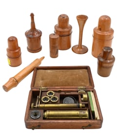 Nine Piece Wooden Lot of Mostly Glass Bottles