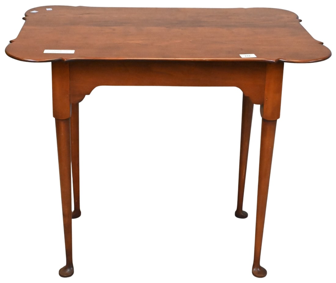 Eldred Wheeler Cherry Queen Anne Style Table: Eldred Wheeler Cherry Queen Anne Style Table having shaped top and pad feet height 27 inches, top 22" x 32 1/2"