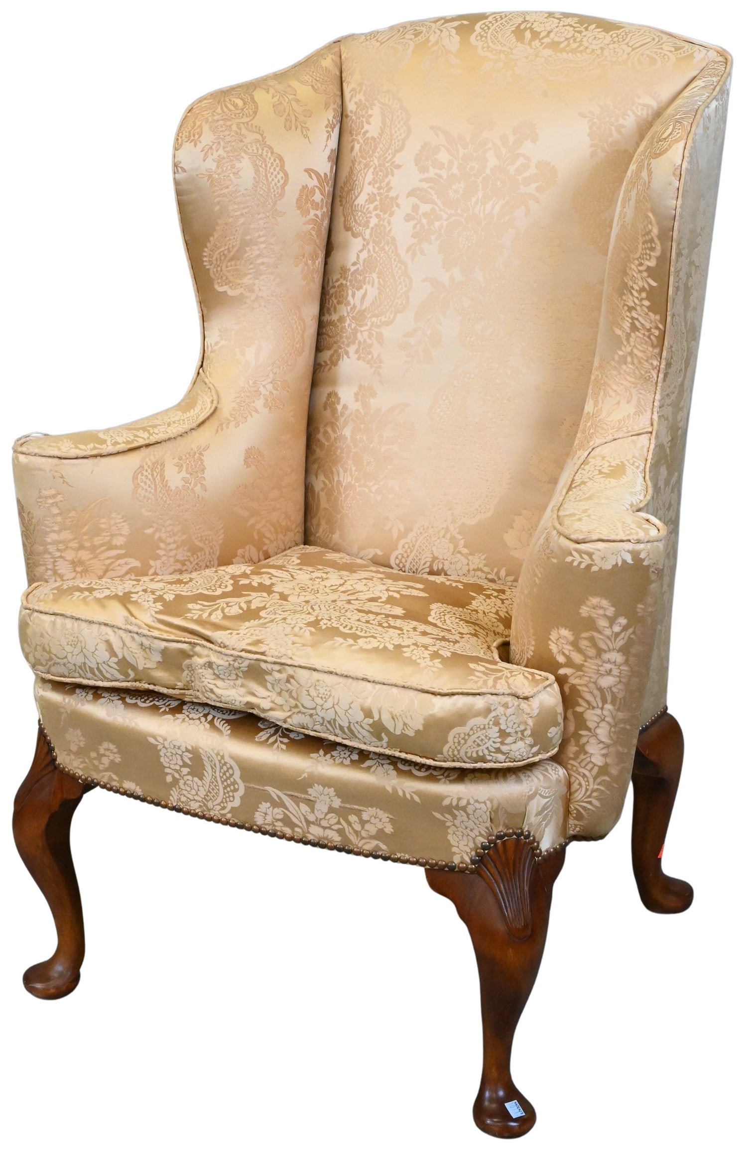 William Tillman Mahogany Queen Anne Style Upholstered Wingback Armchair: William Tillman Mahogany Queen Anne Style Upholstered Wingback Armchair having pad feet height 46 inches, width 33 inches Condition: tears to back of upholstery and fraying to arms