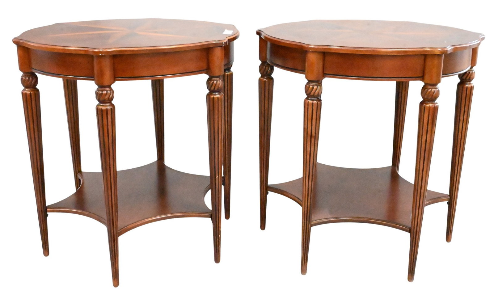 Pair of Butler Bainbridge Round Side Tables: Pair of Butler Bainbridge Round Side Tables having compass inlay, two levels, set on six reeded legs height 27 inches, top diameter 28 inches