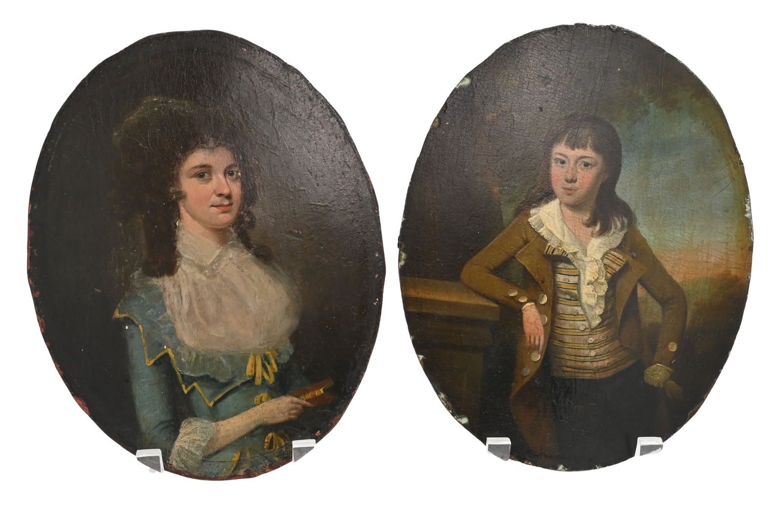Pair of James Smith Senior (British B. 1795) Miniature Oval Portraits: Pair of James Smith Senior (British B. 1795) Miniature Oval Portraits Portrait of a noblewoman in a blue dress holding a book Oil on wood panel 10" x 7 3/4" Portrait of young boy in a waistcoat leanin