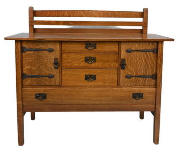 Gustav Stickley #814 1/2 Strap Hinge Oak Sideboard: Gustav Stickley #814 1/2 Strap Hinge Oak Sideboard having three center drawers flanked by two doors over long drawer, hammered copper hardware, plate rail, and having Gustav Stickley trademark wood bu