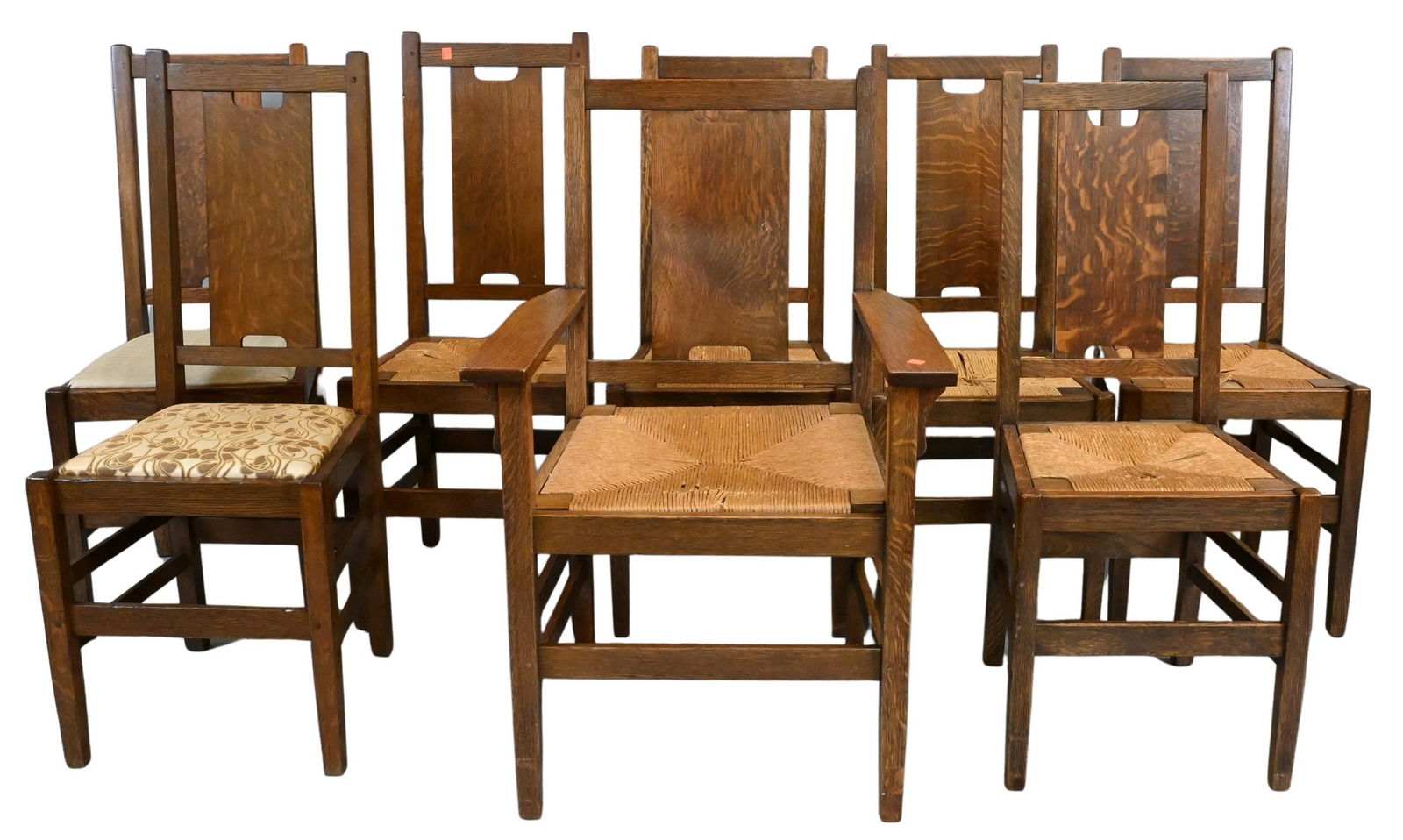 Set of Six Gustav Stickley Craftsman Workshop Chairs: Set of Six Gustav Stickley Craftsman Workshop Chairs to include five side chairs and one armchair, H-shaped back splat, rush seats, one chair signed inside rear stretcher with Gustav Stickley's red de