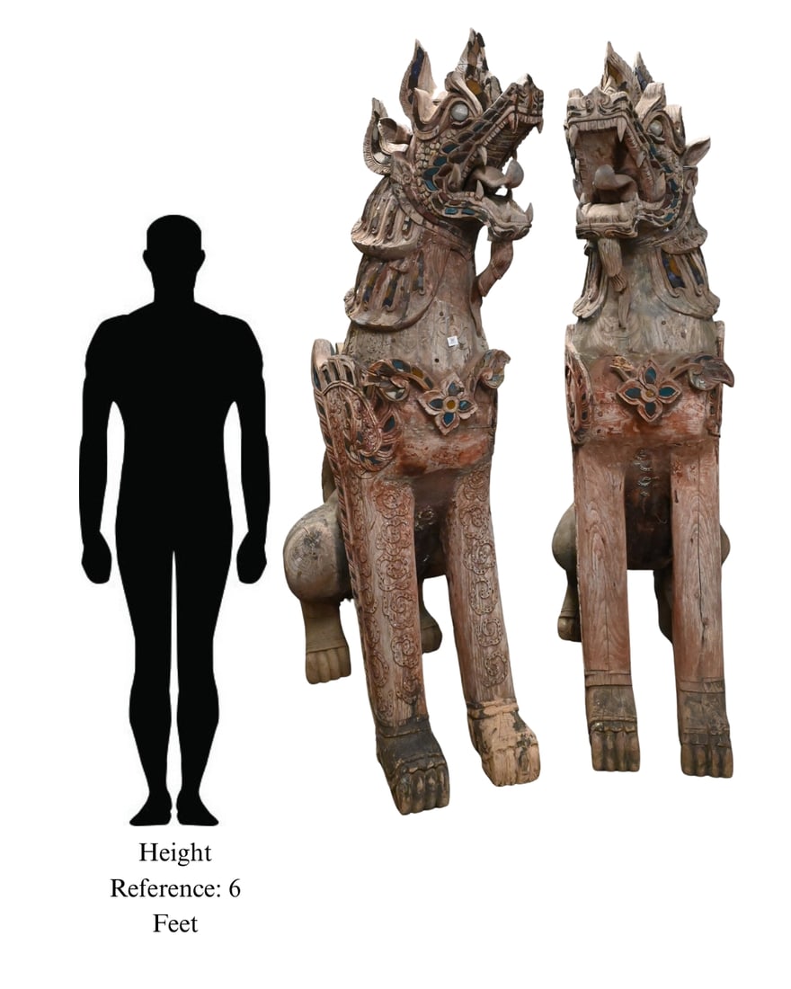 Pair of Monumental South East Asian Guardian Foo Lions: Pair of Monumental South East Asian Guardian Foo Lions possibly Thai Singha Guardian lions, carved and red painted wood depicting the mythological creatures in a sitting position having open mouth bea
