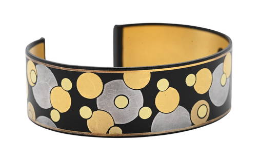 Angela Cummings for Tiffany and Company Damascene Bubble Cuff: Angela Cummings for Tiffany and Company Damascene Bubble Cuff having geometric circle patterns of gold, silver, and iron, signed "T & Co." #1376 outer circumference 7 1/2 inches, inner circumference 6