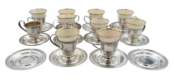Two Sets of Sterling Silver Tea Cups and Saucers