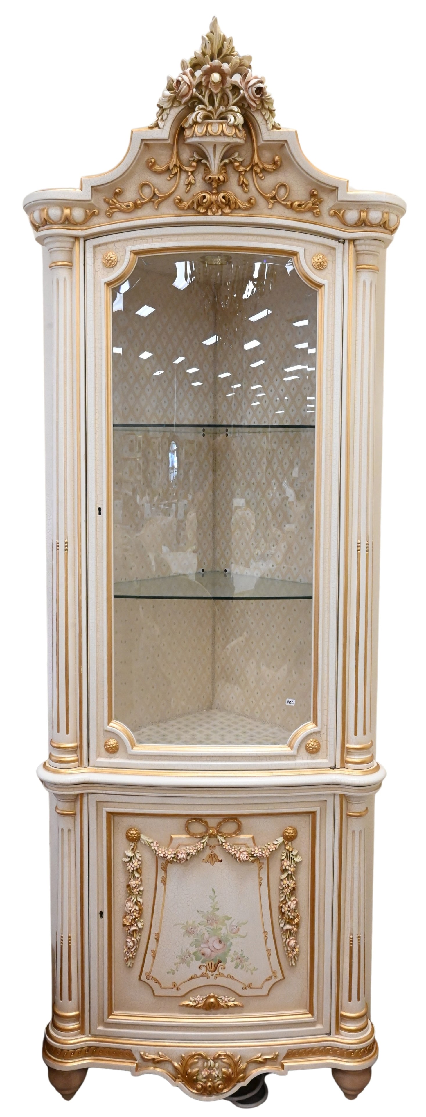 Meroni Francesco For Angelo Cappellini "Degas" Style Corner Cabinet: Meroni Francesco For Angelo Cappellini "Degas" Style Corner Cabinet having carved and giltwood urn and flower pediment surmounting cupboard with glass door opening to glass shelving, flanked by column