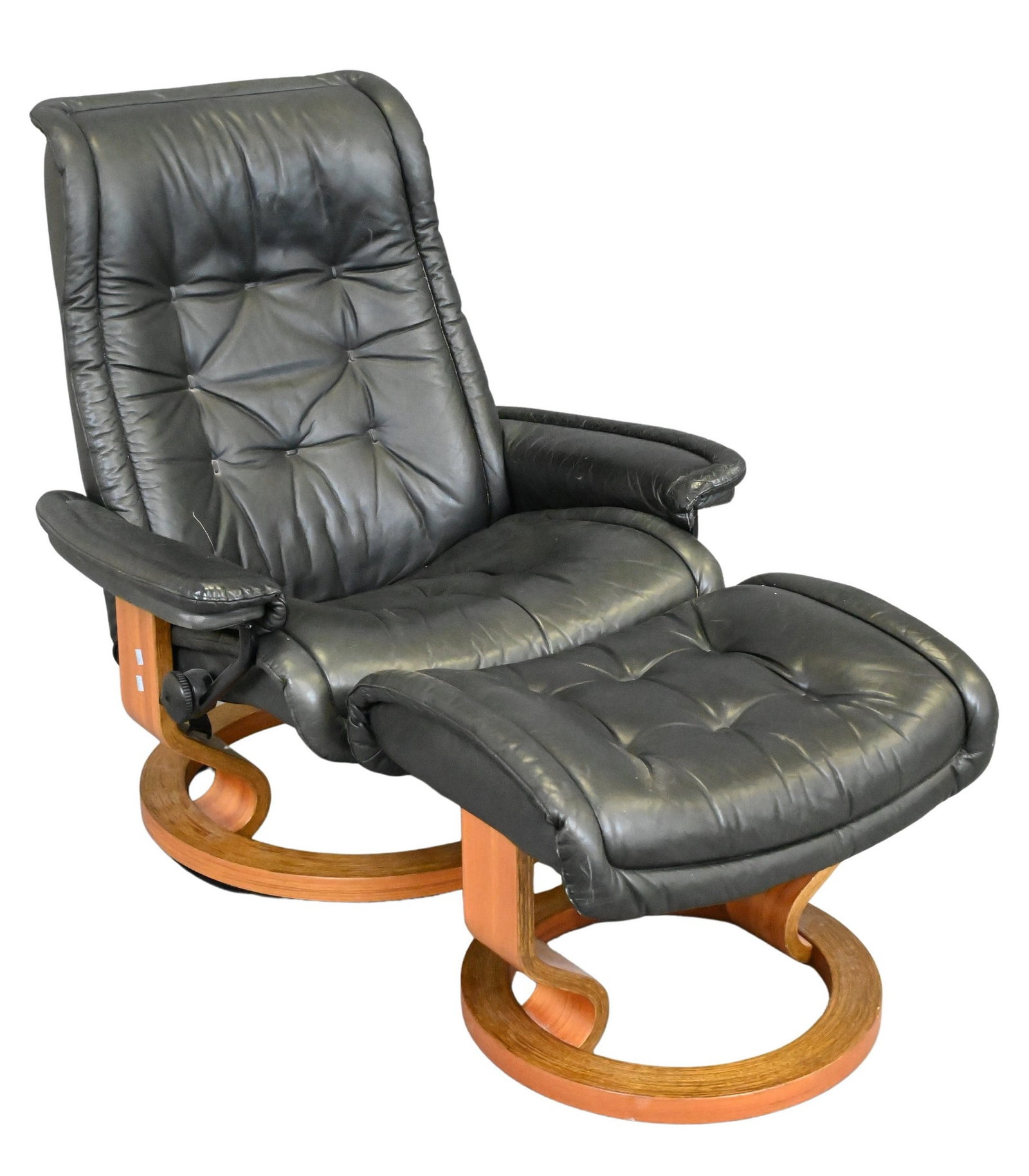 Leather Ekornes Chair and Ottoman: Leather Ekornes Chair and Ottoman height 38 inches, width 34 inches