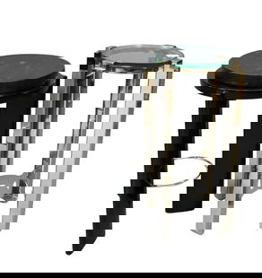 Two Art Deco Round Side Tables: Two Art Deco Round Side Tables to include Global Views Metro side table having thick round glass top set on chrome framework retails for $749, and black lacquered round top table having three thick le