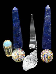 Seven Piece Art Glass Group: Seven Piece Art Glass Group to include Richard Satava moon jellyfish art glass marked Satava 1829-09, pair of Lapis Lazuli blue veneer obelisks, crystal baccarat obelisk, waterford crystal shell paper