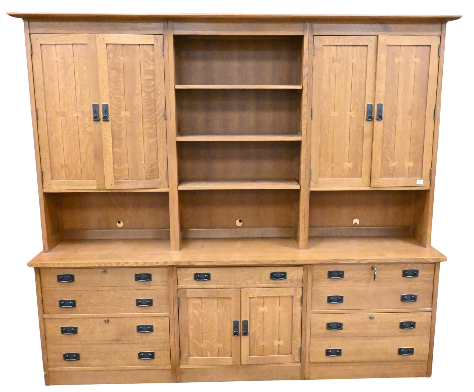Large Stickley Mission Breakfront: Large Stickley Mission Breakfront having three center shevles flanked by two doors over five drawers and single center door, with bowtie inlay and metal pulls, marked Stickley height 85 inches, length