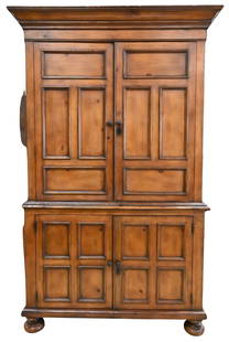 Large Armoire: Large Armoire having two large doors over two smaller doors all over bun feet height 88 inches, width 24 inches, length 51 inches