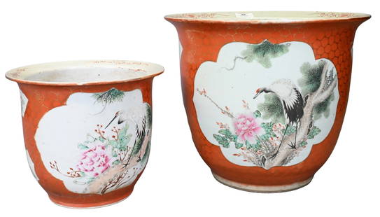 Two: Chinese Iron Red Famille Rose Planters: Two: Chinese Iron Red Famille Rose Planters both having coral red glaze with gilt honeycomb pattern and featuring cartouches with cherry blossom and bird motif, both having drainage holes to bottom he