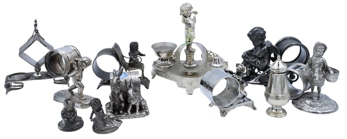 Group of Eight Figural Silver Plate Napkin Rings