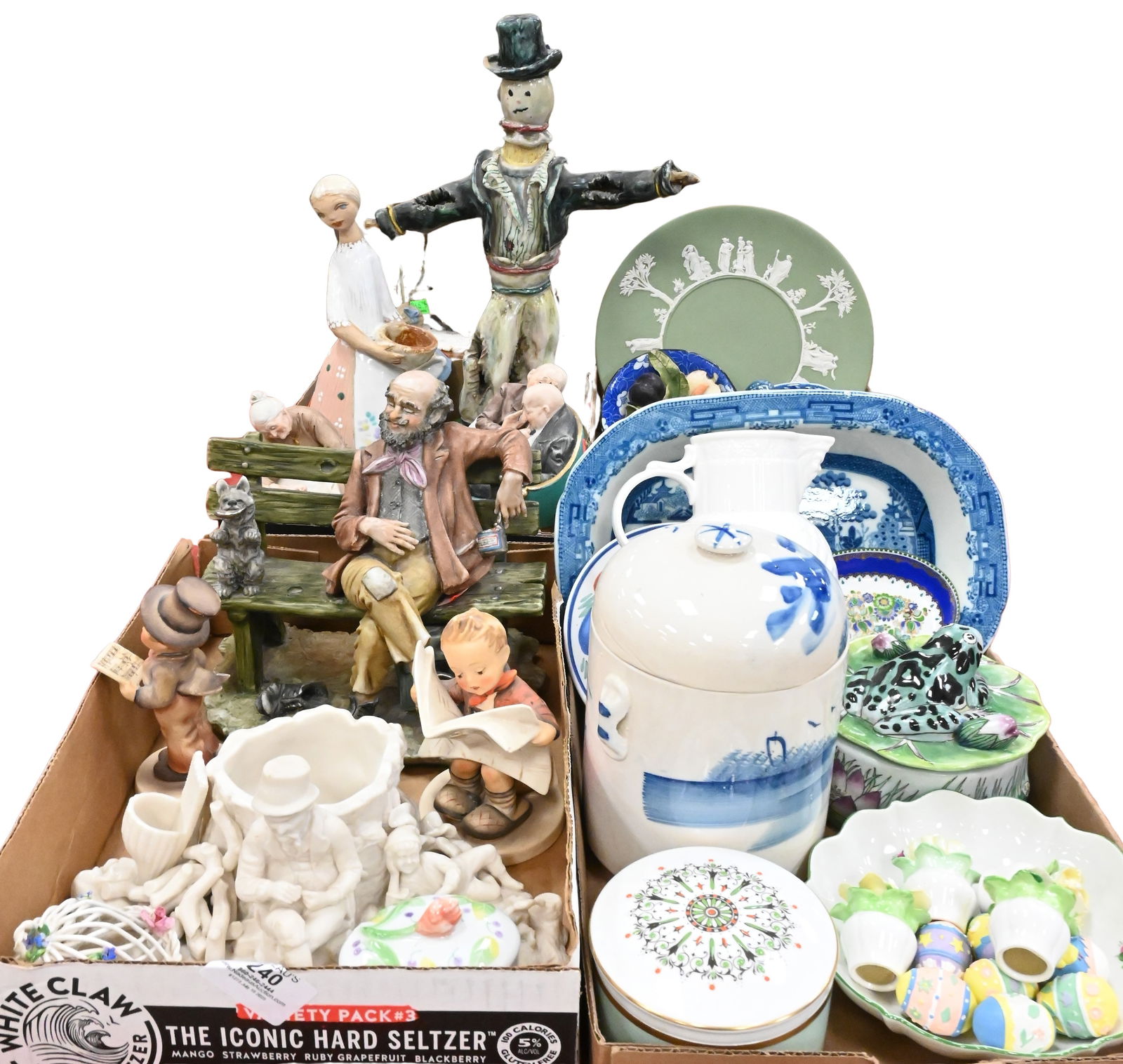 Four Box Lots of Decorative Porcelain: Four Box Lots of Decorative Porcelain to include full bee Hummels, capodimonte Hobo / Vagabond figure on a bench, two capodimonte lawyers on a bench gossiping, grandmother with little girl, majolica s