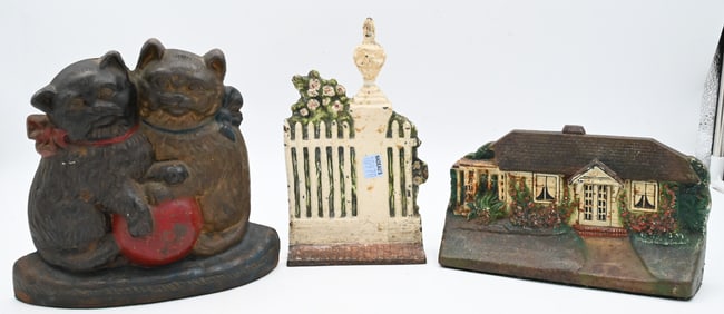Three Antique Cast Iron Painted Doorstops