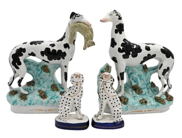 Four Staffordshire Dog Figures