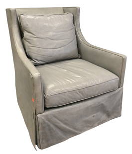 Lillian August Couture Leather Swivel Chair: Lillian August Couture Leather Swivel Chair having light gray upholstery, retails for $4,995 height 37 1/2 inches, width 32 inches, depth 32 inches Provenance: Designer warehouse furnishings from a we
