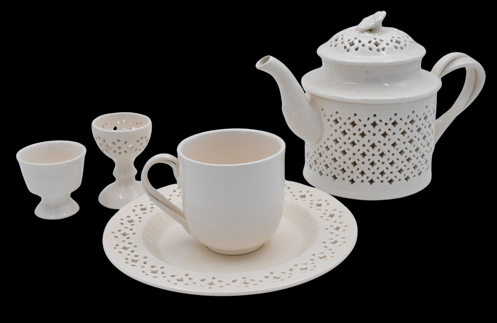 23 Piece Hartley Green Leedsware Creamware Chocolate/ Tea Set: 23 Piece Hartley Green Leedsware Creamware Chocolate/ Tea Set to include strawberry dish, coffee / chocolate pot, four teacups, six egg cups, four saucers, teapot, three openwork covered dishes, two p