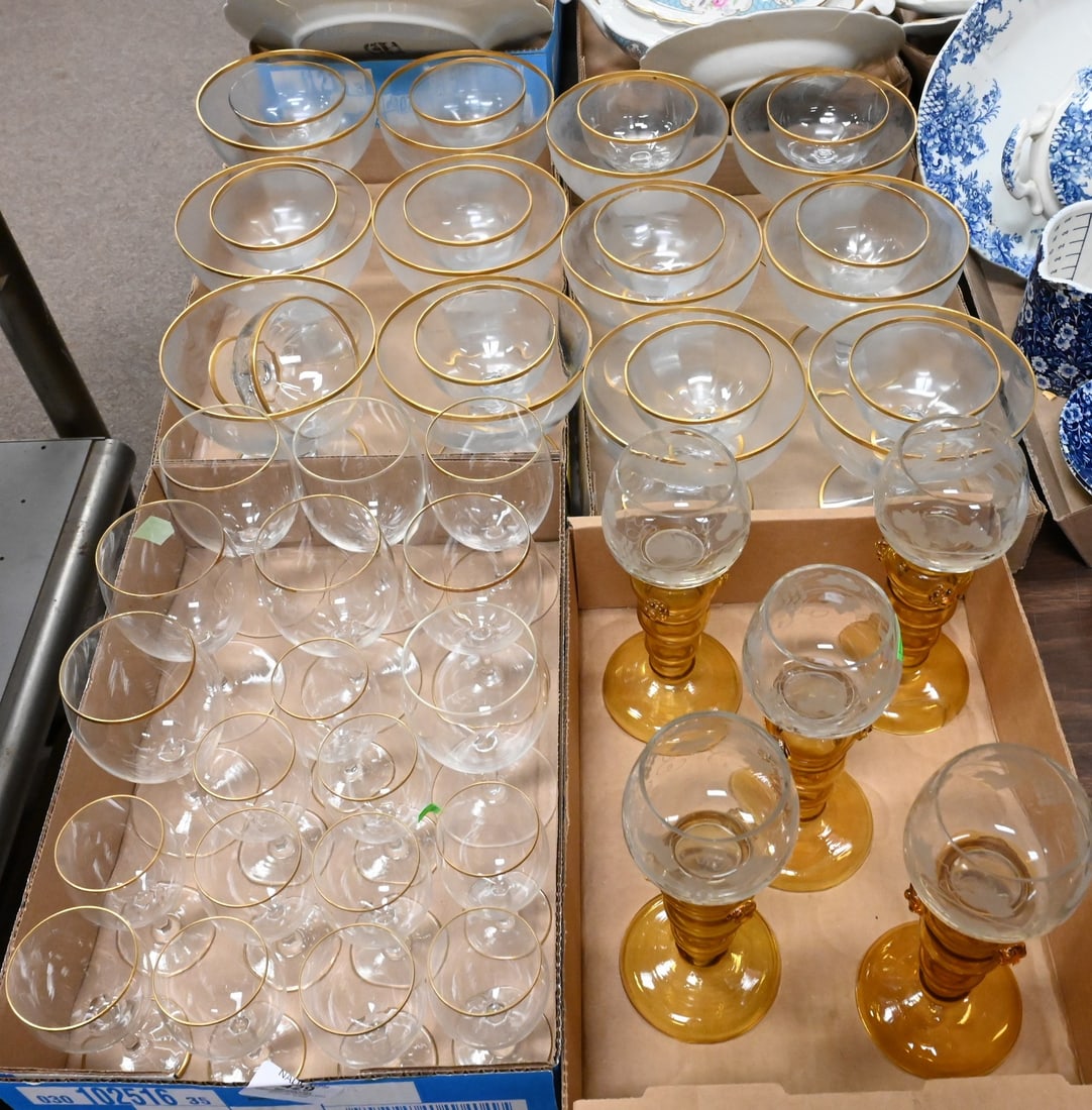 Four Box Lots of Gilt Glassware: Four Box Lots of Gilt Glassware to include 12 shrimp cocktail serug glass sets, eight wine glasses, eleven sniffers or cordials along with five amber and etched glass wine goblets by Theresienthal Roe