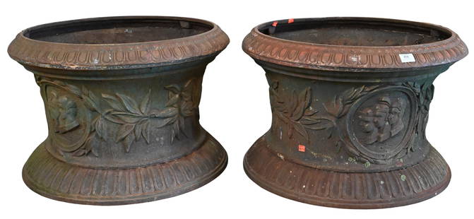 Pair of Large Cast Iron Planters: Pair of Large Cast Iron Planters garden pots having cameo portrait busts and laurel wreath accents height 18 inches, diameter 28 inches