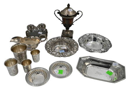 Group of Sterling and Continental Silver: Group of Sterling and Continental Silver to include four Russian cups, gravy bowl, two nut bowls, conch form pin cushion, urn form container, and two other small trays total weight 23.1 t.oz.