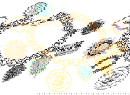 14K Yellow Gold Charm Bracelet: 14K Yellow Gold Charm Bracelet having eight charms to include three heart shaped, one horse shoe, a trolley, and three others length 7 1/2 inches, total weight 31.6 grams
