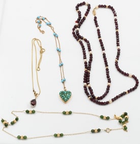 Four 14K Gold Necklaces