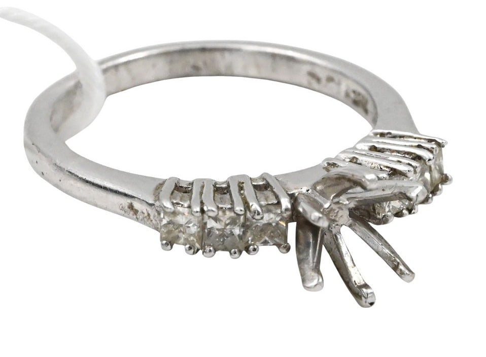 Platinum (950) Engagement Ring Setting: Platinum (950) Engagement Ring Setting center setting flanked by a row of three diamonds size 6 3/4, total weight 5.3 grams