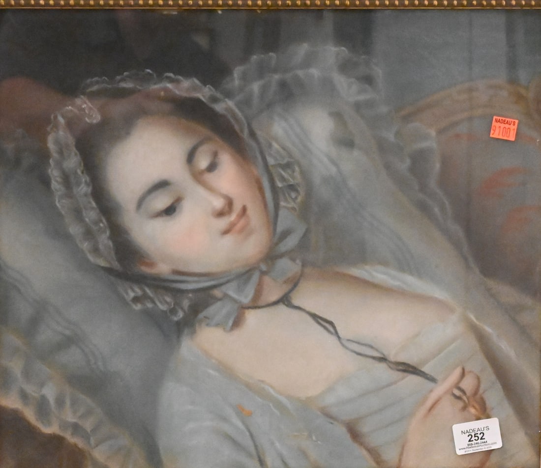 French School (18th Century): French School (18th Century) Portrait of a young woman reclining on a pillow in a lace bonnet and blue dress Pastel on paper Unsigned 15" x 18" Provenance: Property from a prominent New York City coll