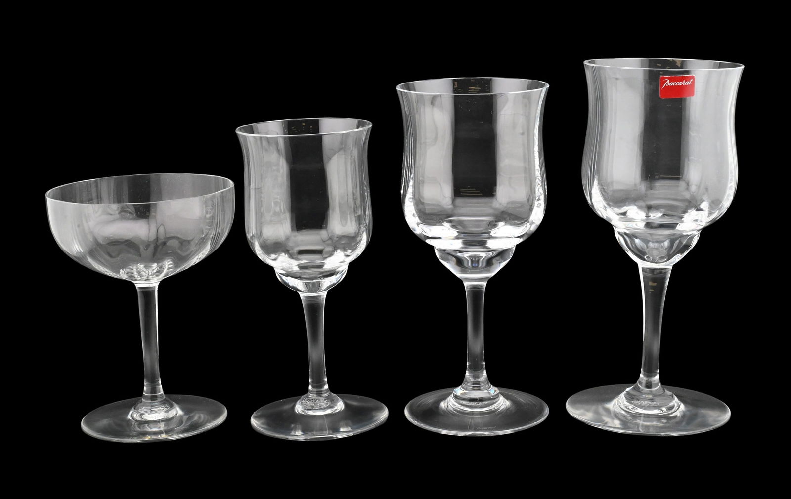 64 Piece Baccarat "Capri" Clear Cut Crystal Stemware Set: 64 Piece Baccarat "Capri" Clear Cut Crystal Stemware Set including 24 (7 1/8 inch) water goblets, 18 (6 5/8 inch) red wine glasses, 9 (6 inch) white wine glasses, 12 (4 3/4 inch) champagne chalices or