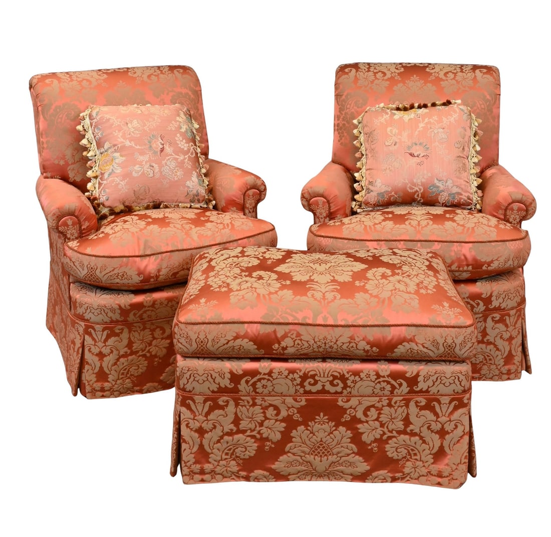 Pair of Upholstered Club Chairs and Ottoman: Pair of Upholstered Club Chairs and Ottoman pair of traditional rolled-arm club chairs and a matching ottoman, all upholstered in coral and gold damask fabric, each chair with a coordinating tasseled