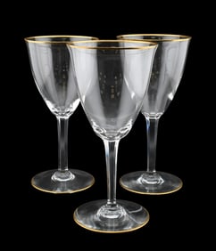 Set of Twenty-Four Baccarat Signed Crystal Wine/Water Goblets with Gilt Rims