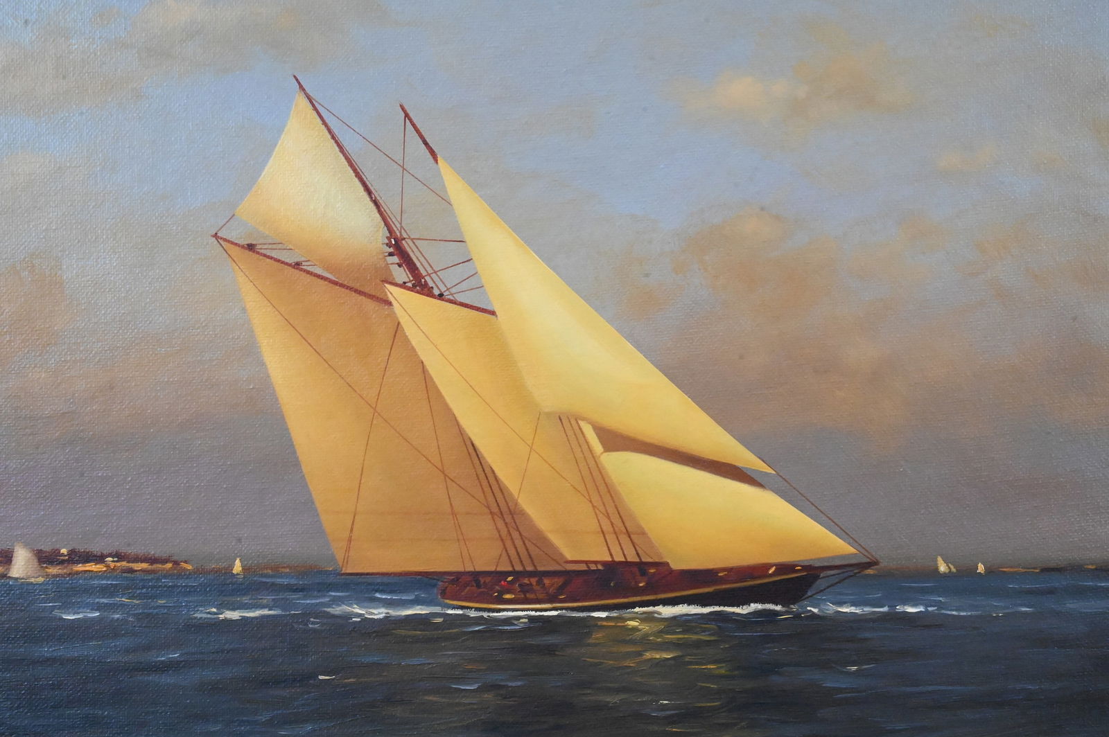Vernon Broe (American 1930-2011): Vernon Broe (American 1930-2011) “Sailing off Newport” depicting a sleek racing yacht cutting across choppy blue water beneath luminous golden sails, with Newport’s shoreline and add